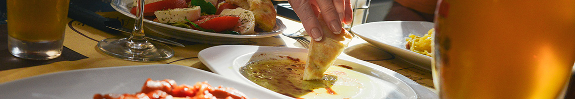 Eating Mediterranean Middle Eastern Tapas/Small Plates at Olive Bistro Midtown Meze & Wine Bar restaurant in Atlanta, GA.